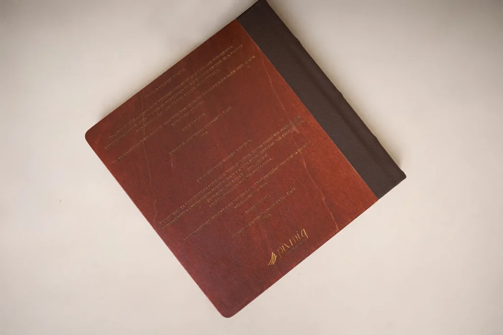 Text on wooden album cover