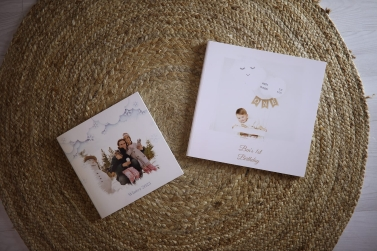 Two albums of different sizes.
